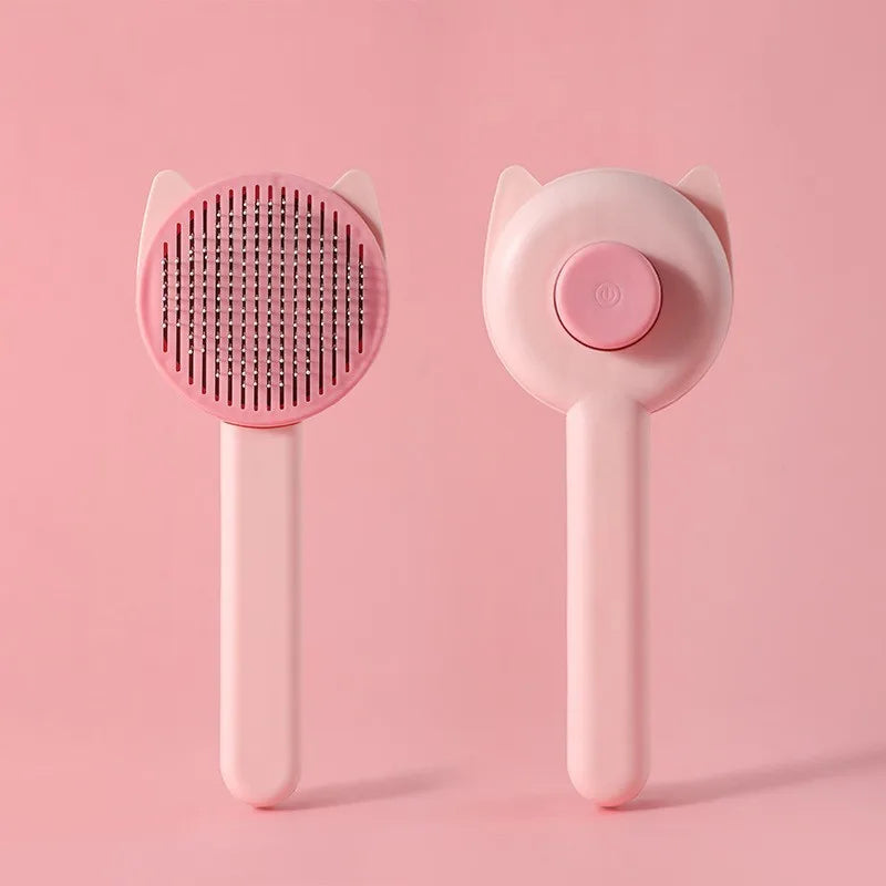 ピンク色のペット用ブラシ(セルフクリーニング機能付き)、Petopop製、猫耳付き