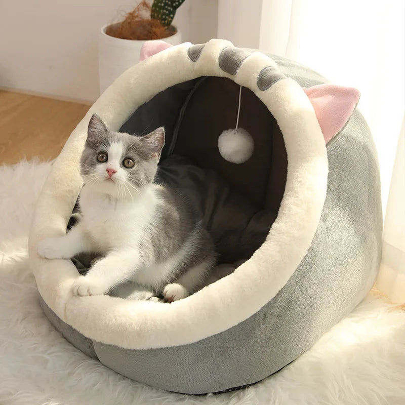 【PetoPop】の洗えるドーム型キャットベッド（猫ちぐら）、ふわふわのクッション付き、猫耳のデザインが可愛らしい。